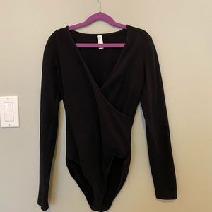 Black, American apparel wrap body suit.